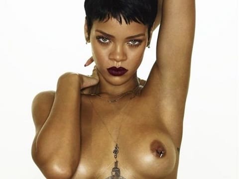 Rihanna shows nude tits for Playboy